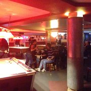 a billiards table and a pool table