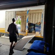 Professional mover off loading shipment into storage at our secure warehouse at 600 Orange St, Chico Ca