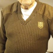 This photo prompted Dad's holey old sweater to be repaired