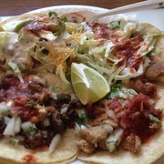 Veggie, fish, chicken, and steak tacos