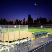 a baseball field at night