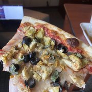 Veggie pizza with olives, artichoke, garlic