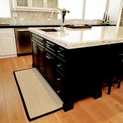 Kitchen remodel which included carefully transporting over-sized granite carefully and handcrafting it for the new counter tops.
