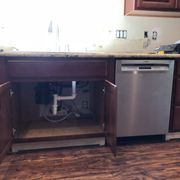 After...I installed a new kitchen sink, kitchen faucet, with garbage disposal and p-trap, dishwasher with air gap.