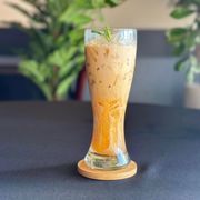 a drink in a tall glass