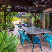 Landscape design for dining area under pergola in Chico, CA