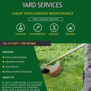 a man mowing grass