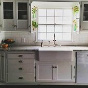 a kitchen with a sink and dishwasher