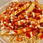 a close up of a meal in a styrofoam container