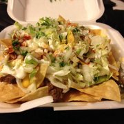 Beef nachos, there is plenty of cheese sauce and beef under there too