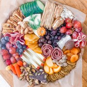 a platter of cheese and crackers