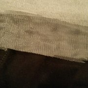 The bottom of my dress she said she hemmed, all 5 layers look like this. I could have cut it better than this.