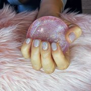 Natural nail gel polish manicure and glitter accent nail