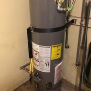 Replaced a old water heater with a leaking tank with a more energy efficient model with code upgrades.