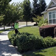 a man mowing the lawn