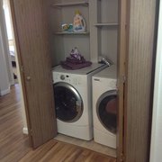 Modern laundry with ample storage space!