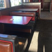 a row of booths in a diner