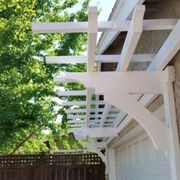 a white pergolated roof