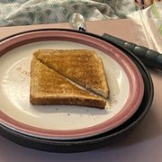 Breakfast consisted of dry toast and yogurt served by nurse to resident and that was ALL she brought