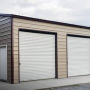 30x40x10 Garage with Three Side Entry 10x8 Garage doors and a walk in door.