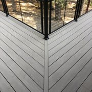 a deck with a railing
