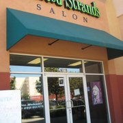 Twisted Strands Hair Studio located in front of Tinsletown