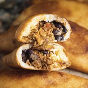 Pabellón Empanada: Shredded Beef, black beans, plantains and white cheese