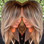 Hand painted balayage root retouch and blow out .