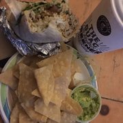 Got a chicken burrito with white rice, pinto beans, guac, cheese, lettuce, and sour cream! Also a Cola + chips & Guac