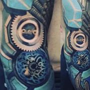 Mechanical close up of sleeve tattoo.