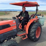 Weed control via tractor at Corning Municipal Airport