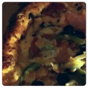 sticker in my pizza..=[
