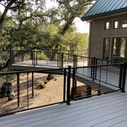 a view of a deck with railings