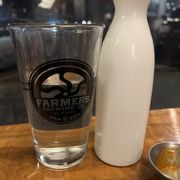 Water & unfiltered sake. They don't serve it in a bottle but in a carafe... definitely different.