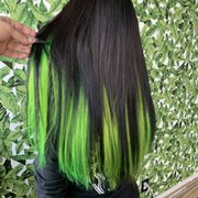 Vivid / black tape in hair extensions , root retouch , flat iron.