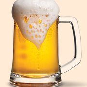 a mug of beer with foamy foam