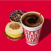 a cup of coffee and a sandwich