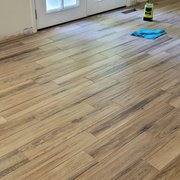a hardwood floor being installed