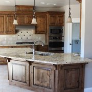 Knotty alder wood, Salem maple stain with black break away glaze.