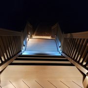 Beautiful lighted stairs by Harmonic Construction