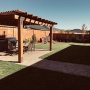 an outdoor kitchen and grill
