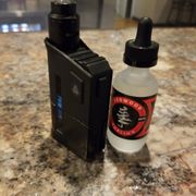 a lighter and a bottle of liquid