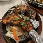 Tandoori Chicken drumsticks (comes with Basmati rice, cucumber and tomato salad and creamy mint sauce.