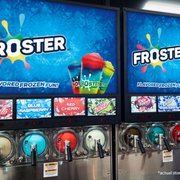 a row of frozen drinks in a store