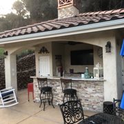 Out door kitchen and pool houses.