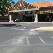 the entrance to a convenience store