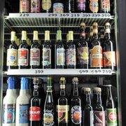 a refrigerator full of beer bottles