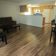 Funished single lease unit with comfy couches and dining area!