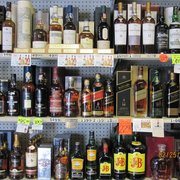 shelves full of liquor bottles