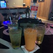 two drinks on a table in a restaurant